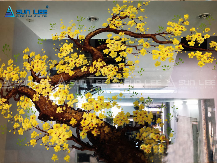 Trang trí Tết trên cửa kính tết với cành mai sặc sỡ